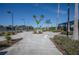 Walkway leading to tennis courts and other amenities at 5560 Club View Ln, North Port, FL 34287