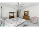 Spacious bedroom with a comfortable bed and ample closet space at 615 Apple Ln, Englewood, FL 34223