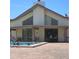 Community pool area with clubhouse in background at 615 Apple Ln, Englewood, FL 34223