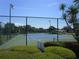 Enjoy a sunny day playing tennis on this well-maintained court at 615 Apple Ln, Englewood, FL 34223