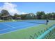 Enjoy a game of tennis on this community court at 615 Apple Ln, Englewood, FL 34223