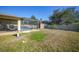 Backyard with a screened pool, patio furniture, and shed at 6176 Catalan St, Englewood, FL 34224