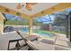 Enjoy this covered lanai overlooking the pool and backyard at 6176 Catalan St, Englewood, FL 34224