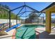 Relaxing screened pool with brick coping and storage shed at 6176 Catalan St, Englewood, FL 34224