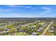 Bird's-eye view of house and neighborhood at 62 Marker Rd, Rotonda West, FL 33947