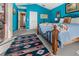 Bright bedroom with a comfortable bed and access to a hallway at 62 Marker Rd, Rotonda West, FL 33947