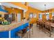 Charming dining area with rustic wooden table and chairs at 62 Marker Rd, Rotonda West, FL 33947