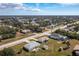 Aerial view showcasing home and neighborhood at 7035 Sunnybrook Blvd, Englewood, FL 34224