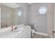 Clean bathroom featuring a vanity, toilet and bathtub at 7180 Brittany Cir, Englewood, FL 34224