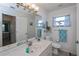 Bathroom with single vanity, toilet, and shower/tub combo at 7336 Brookhaven Ter, Englewood, FL 34224