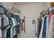 Large walk-in closet with ample hanging space and shelving at 7336 Brookhaven Ter, Englewood, FL 34224