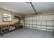 Garage with workbench and ample storage at 7336 Brookhaven Ter, Englewood, FL 34224