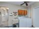 Laundry room with washer, dryer, and utility sink at 7336 Brookhaven Ter, Englewood, FL 34224