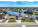 Aerial view of single-Gathering home with water access at 7398 Spinnaker Blvd, Englewood, FL 34224