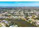 Wide view of the house and its location in the community at 7398 Spinnaker Blvd, Englewood, FL 34224