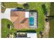 Top-down view of the home, highlighting the pool and canal view at 7398 Spinnaker Blvd, Englewood, FL 34224