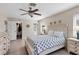 Spacious bedroom with a comfortable bed and ample storage at 7398 Spinnaker Blvd, Englewood, FL 34224