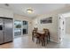 Kitchen with stainless steel appliances and view of the pool at 7398 Spinnaker Blvd, Englewood, FL 34224