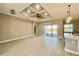 Bright and airy living area with open floor plan and access to the backyard at 7410 Grand Concourse St, Englewood, FL 34224