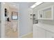 Updated bathroom with white vanity and separate toilet area at 7438 Banbury Ter, Port Charlotte, FL 33981