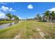 Spacious backyard with a canal view at 8 Broadmoor Ln, Rotonda West, FL 33947