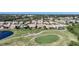 Aerial view of homes and golf course at 8377 Parkside Dr, Englewood, FL 34224