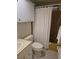 Clean bathroom with a shower/tub combo and white vanity at 8479 Tanaka Dr, Englewood, FL 34224