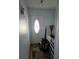 Bright entryway with an oval-shaped glass door at 8479 Tanaka Dr, Englewood, FL 34224