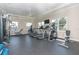 Well-equipped fitness center with treadmills and weight machines at 8960 Scallop Way, Placida, FL 33946