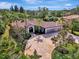 Aerial view of house showing roofline and landscaping at 910 Park Place Dr, Englewood, FL 34223