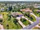 Aerial view of house and surrounding neighborhood at 910 Park Place Dr, Englewood, FL 34223