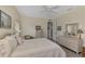 Spacious bedroom with a dresser and ceiling fan at 910 Park Place Dr, Englewood, FL 34223