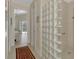 Hallway with glass block shower and bedroom view at 910 Park Place Dr, Englewood, FL 34223