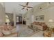 Comfortable living room with sliding doors to backyard at 910 Park Place Dr, Englewood, FL 34223