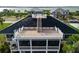 Multi-level home with large rooftop deck at 9860 Eagle Preserve Dr, Englewood, FL 34224