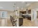 Modern kitchen with granite countertops, stainless steel appliances, and an island at 1 Calm Ct, Placida, FL 33946