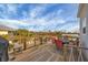 Wooden deck with table and chairs overlooking the water at 10451 Sherman St, Englewood, FL 34224