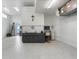 Large garage workshop featuring a built-in workbench and ample storage at 10544 Poughkeepsie Cir, Port Charlotte, FL 33981