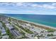 Scenic aerial view of the beach, coastline and local parking areas at 1100 Gulf Blvd, Englewood, FL 34223