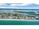 Scenic aerial view of beachfront homes in beautiful coastal community at 1100 Gulf Blvd, Englewood, FL 34223