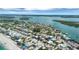 Scenic aerial view of a coastal community, waterfront and boats at 1100 Gulf Blvd, Englewood, FL 34223