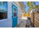 Charming home featuring a bright blue door and white siding, ready for coastal living at 1100 Gulf Blvd, Englewood, FL 34223