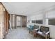 Living room with wood-look tile flooring, ready for your own remodeling ideas at 1100 Gulf Blvd, Englewood, FL 34223