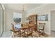 Dining room with wooden table and hutch at 12075 Duval Blvd, Port Charlotte, FL 33981