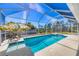 Inviting screened-in pool with a spacious patio area at 12075 Duval Blvd, Port Charlotte, FL 33981