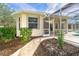 Walkway to screened pool and patio area at 12650 Montigello Ct, Englewood, FL 34223