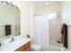 Small bathroom with shower/tub combo and vanity at 12650 Montigello Ct, Englewood, FL 34223