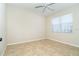 Bedroom with tile flooring and ceiling fan at 12650 Montigello Ct, Englewood, FL 34223