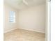 Spacious bedroom with tile flooring and window blinds at 12650 Montigello Ct, Englewood, FL 34223