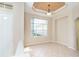 Sunlit dining room featuring a window and tile floor at 12650 Montigello Ct, Englewood, FL 34223